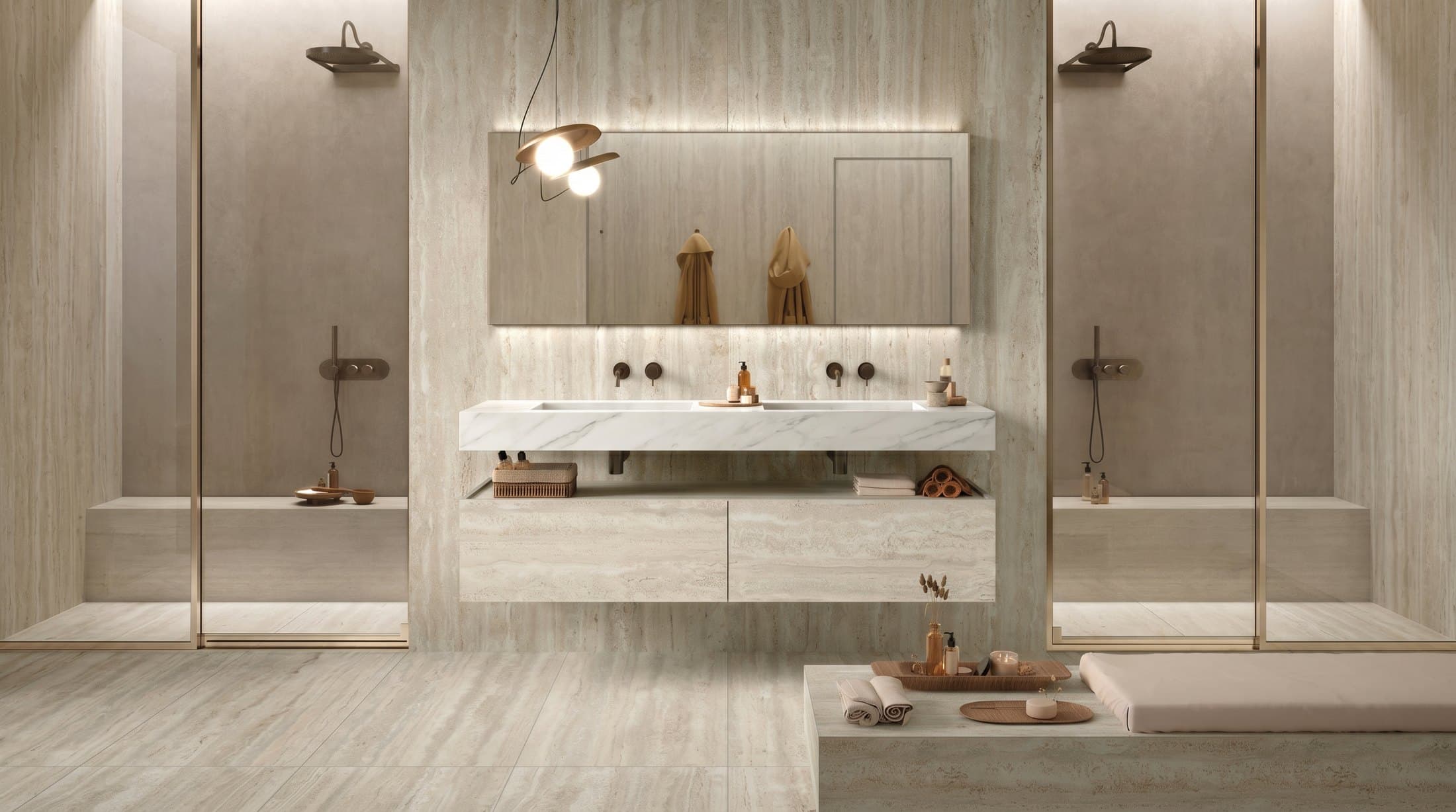 Bathmood look with a white marble vanity, travertine walls and a pale stone floor
