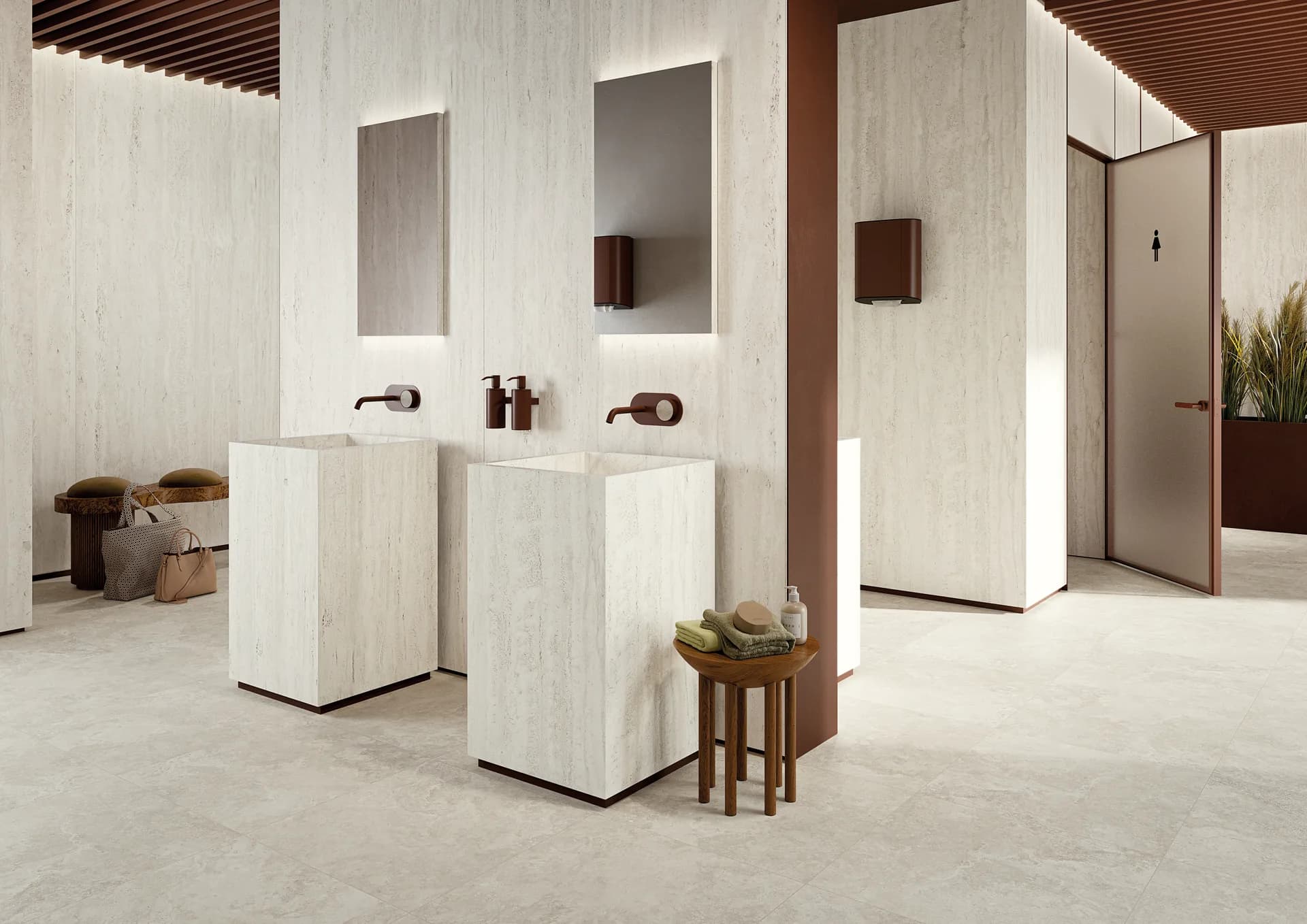 Bathroom with pedestal basins and wall-mounted taps