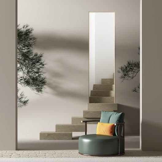 Travertine stair with a green lounge chair and a full-height mirror
